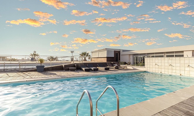 Lagoon Beach Apartment | Ocean View Beach Retreat with Pool and Spa Amenities