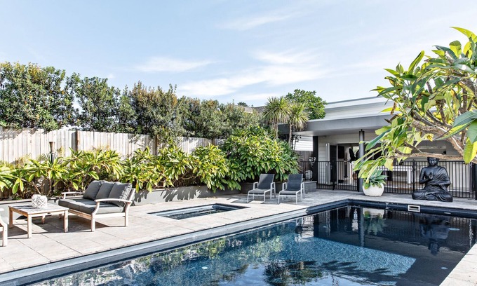 Werri Beach House | Relax at Sundara Beach House: Ocean Views & Heated Pool