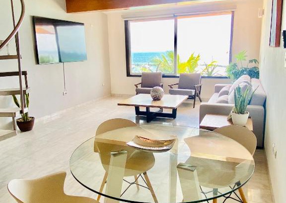 Puerto Juarez Apartment | Beachfront Oasis with Ocean View and Pool Access