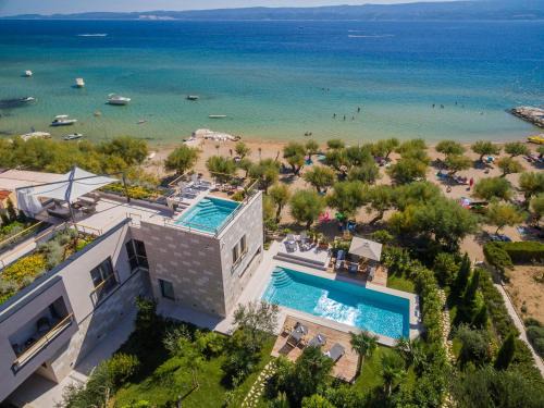 Omis Villa | Coastal Retreat at Villa Flores with Heated Pools & Ocean Views