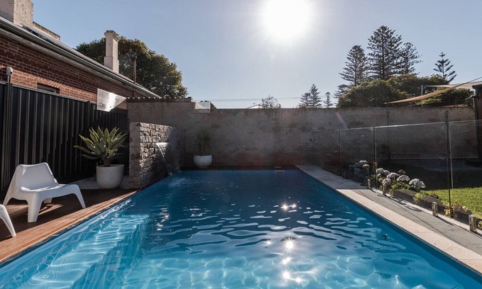 Glenelg House | Elegant Bungalow on Pier with Heated Pool & Pet Friendly