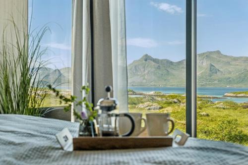Vagan Apartment | Elegant Lofoten Cabin with Jacuzzi, Sauna & Ocean Views