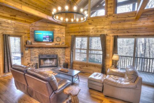 Helen House | Riverside Retreat: Pet-Friendly Cabin with Hot Tub near Helen