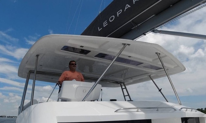 Flag Hill Boat Rental | Luxury Catamaran with Four Bedrooms, Fwd and Aft Deck, Private Patio, Swim Lift.