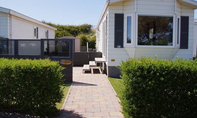 IJmuiden Ski Chalet | Elegant Blue Sea Thistle Chalet with Ocean Views & Pool