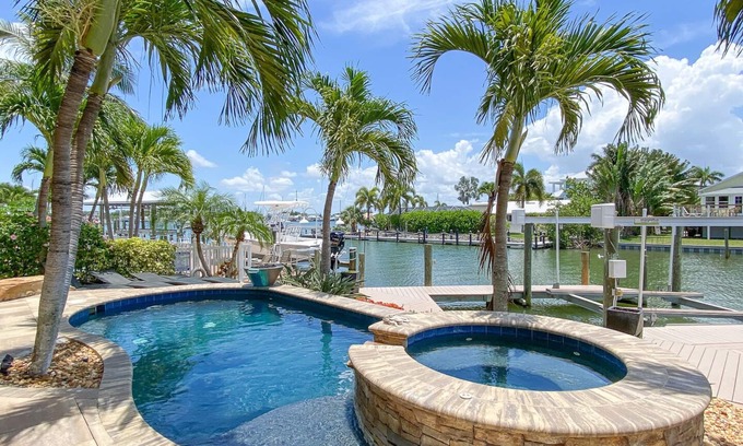 Clewiston House | Seaside Retreat with Heated Pool, Steps from FMB Beach