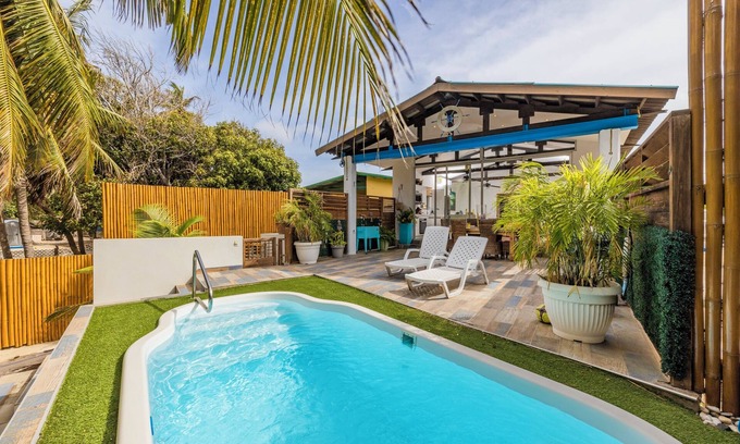 Pos Chiquito House | Exquisite Waterfront Villa with Pool & Ocean Views