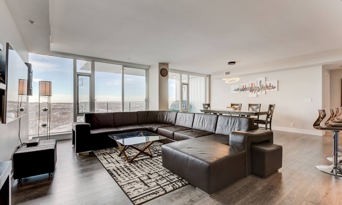 East Village Condo | Elegant Riverfront Sub-Penthouse Condo Near Stampede