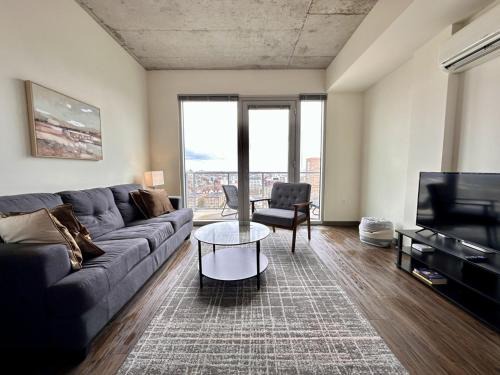 Lower East Side Apartment | Modern East Side Studio with Gym and Balcony Access