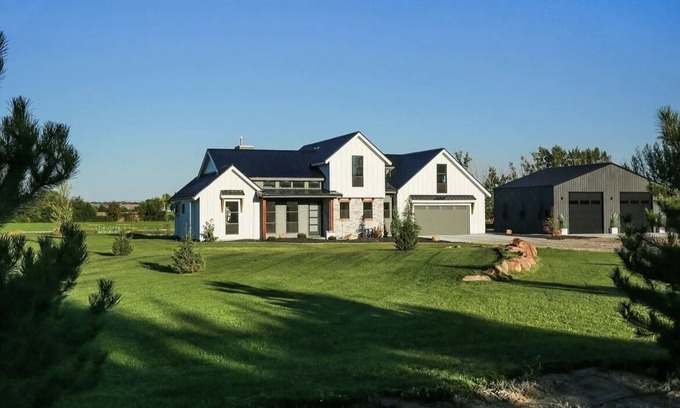 Payette House | Luxury Farmhouse on 50 acres with a pond and private beach in the backyard. Wow