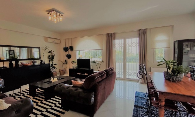 Glyfada Apartment | Elegant Garden Apartment in Glyfada with Pool & Breakfast
