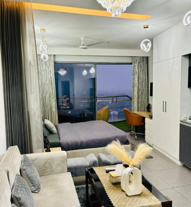 Noida Apartment | Stunning Heights: City & River Views with Pool Access