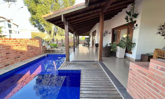 Sao Pedro da Aldeia Condo | Indulge in a Poolside Retreat at Luxury Condominium