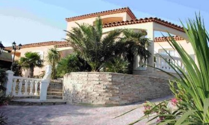 Garrigues House | Elegant Retreat with Garden, Pool & Golf Course Access