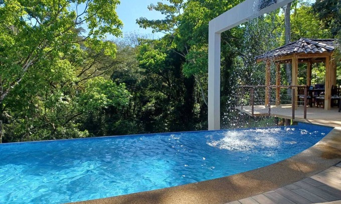 Esterillos Villa | Exquisite Jungle Retreat with Ocean Views & Pool Access