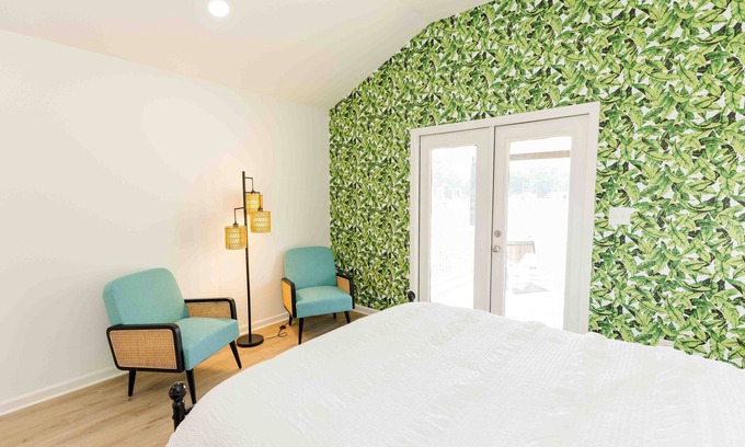 Lincoln House | Tranquil Lake Bungalow: King Bed & Scenic Deck Access