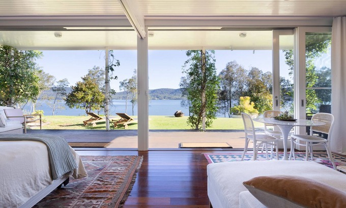 Coomba Bay House | Elegant Lakefront Suite with Pet-Friendly Amenities