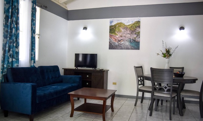 Saint George Parish House | Elegant Master Suite Apartment with Ocean View in Roseau