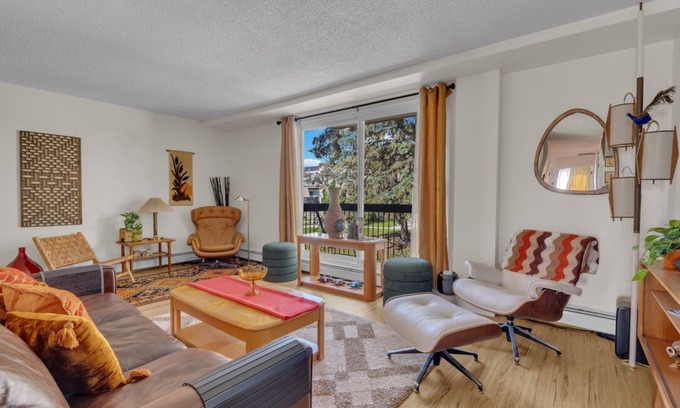 Southeast Calgary Condo | Luxury Midcentury Modern Suite - Remote Worker Focused