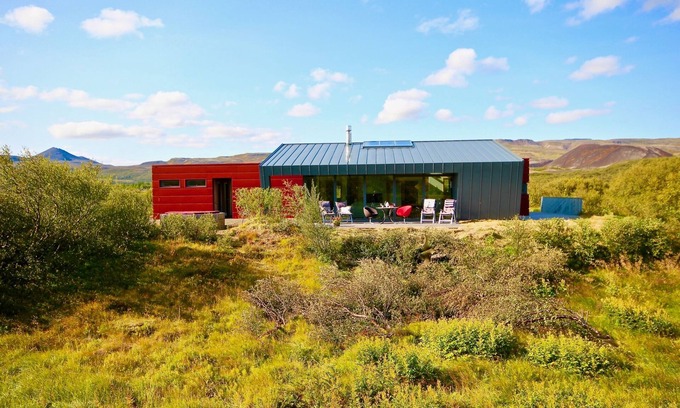 Bifroest Cottage | Tranquil River & Mountain Views with Hot Tub and Spa