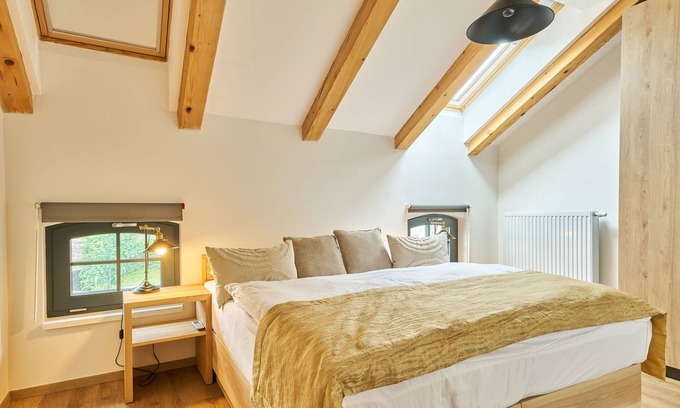Cerny Dul Apartment | Luxury Mountain Attic by Interhome