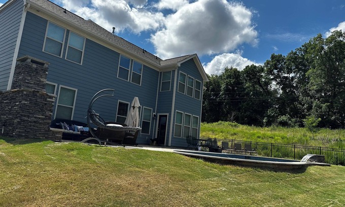 Riverview House | Discover Oasis Pool & Patio with Spa and Pet-Friendly Amenities