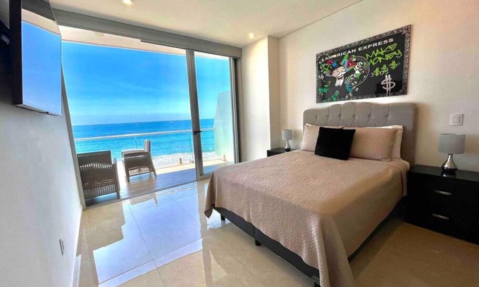 Zona Dorada Apartment | Oceanfront Relaxation at Camino al Mar with Heated Pool