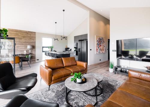 Vestmannaeyjar Villa | Exquisite Ocean Villas: 4-Star Getaway with Hot Tub