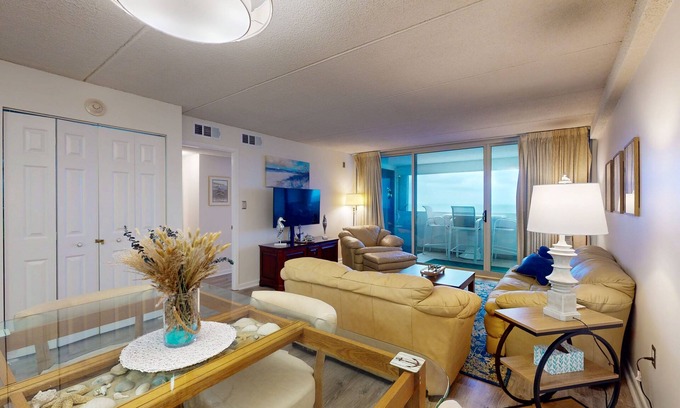 North Ocean City Condo | Luxury Oceanfront - beach condo with balcony, shared pool, WiFi, wash/dryer & AC