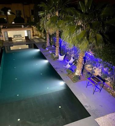 Annakhil Villa | Relaxing Palm Villa: 4-Star Retreat with Pool & Pet-Friendly