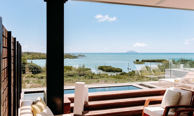 Calebasses Apartment | Luxury Penthouse - stunning lagoon view, 4 bedroom, private pool & communal pool