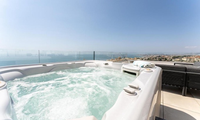 Fuengirola Apartment | Exclusive Penthouse Retreat with Rooftop & Hot Tub