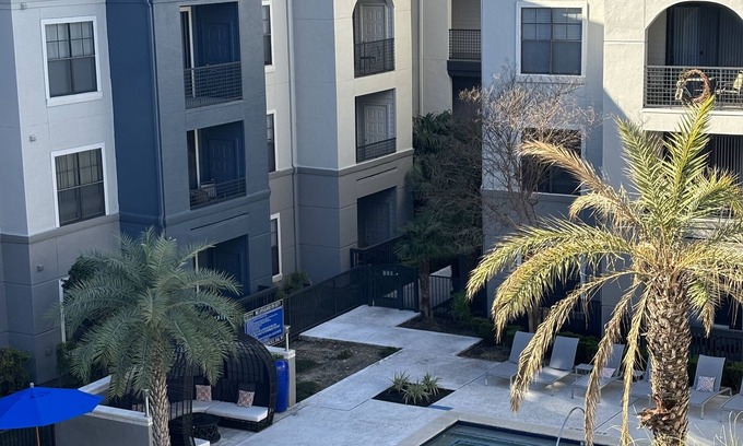South Central Houston Condo | Pool View Retreat Steps from NRG Stadium - Guest Rated 9.8