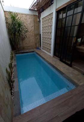 Gresik House | Elegant Poolside Retreat at Vila Raima for Your Family