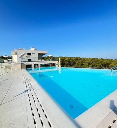 Dugis Apartment | Rooftop Apartment with Oceanfront Views and Pool Access