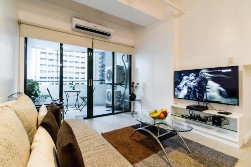 Salcedo Village Apartment | Stylish 2BR Retreat in Salcedo Village with Pool & Hot Tub