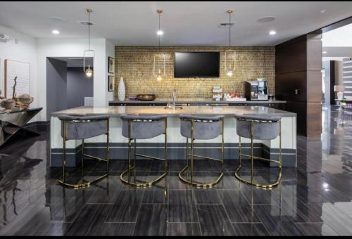 Memorial Apartment | Elegant Stays with Tylaco: Poolside Retreat for Families
