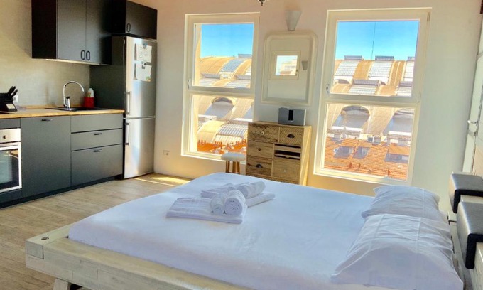 Ponte Seveso Apartment | Stylish Studio with Unique Views Near Main Station