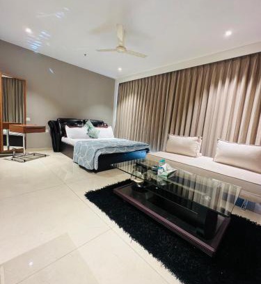 Gurugram Apartment | Elegant Oceanfront Studios with Pool & Hot Tub