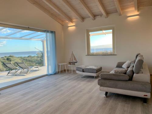 Orosei Villa | Elegant Seaview Villa by SardiniaGem - Pet Friendly Oasis