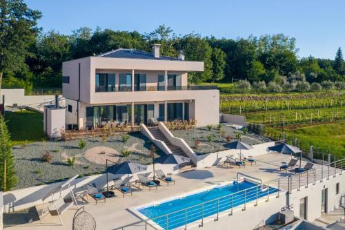 Sveta Nedelja Villa | Elegant Villa Callista: Garden Oasis with Heated Pool