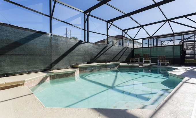 Windwood Bay House | Discover a Dream Villa Near Disney with Pool & Theater