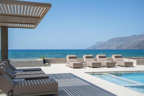 Nopigia Villa | Beachfront Bliss at Villa EOS with Pool and Ocean Views