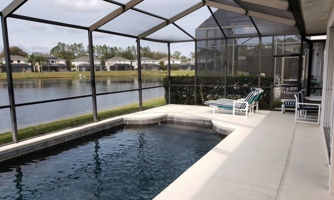 Sunset Lakes Villa | Guest Rated 10/10: Lake View Villa with Heated Pool Near Disney