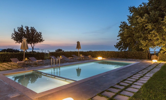 Tria Monastiria Villa | Exquisite Villa with Heated Pool and Ocean View Near Beach