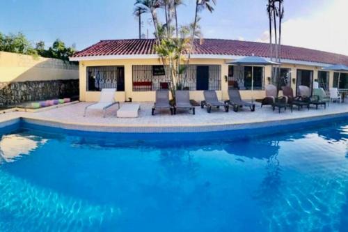 Guayacanes Apartment | Relaxing Villa with Pool Steps from the Beach