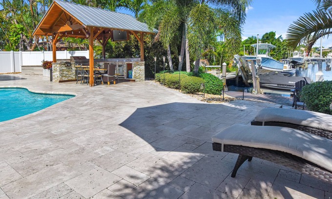 Garden Isles House | Waterfront Paradise Retreat with Heated Pool and Spa
