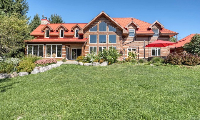 Dashwood House | Enchanting Grand Bend Log Cabin with Private Pond Retreat