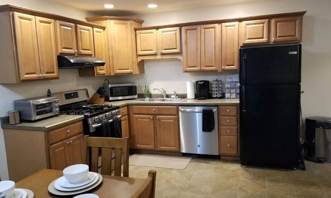 Bourbonnais House | Cozy Private Apartment by Lyle and Taylor with Kitchen