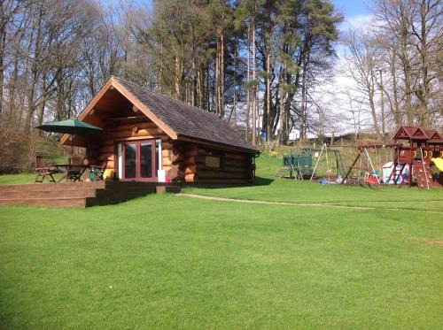 Wing Cabin | Discover Lyne View Log Cabin: Pet-Friendly Retreat